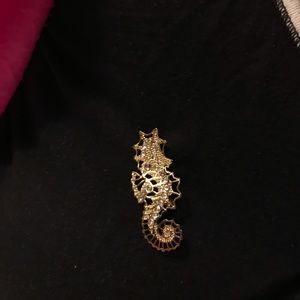 Seahorse gold colored pin with Swarovski crystals